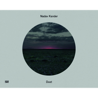 The cover of the photography book Dust by Nadav Kander, published by Hatje Cantz. The cover is a textured light gray-green with a circular cutout in the center, revealing a photograph of a dark, vast plain under a cloudy twilight sky, with a sliver of vibrant pink and purple sunset on the horizon.