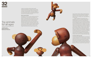 A two-page spread from a design book about the iconic wooden monkey toy designed by Kay Bojesen in 1951. The page is titled Toy animals for all ages and features several photographs of the monkey from different angles, showcasing its articulated limbs and two-tone wood construction against a plain background with columns of text.