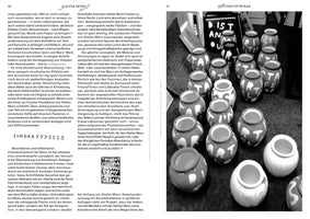A black-and-white two-page spread from a book. The page on the right features a large photograph of many small, rounded ceramic pots clustered together on the floor. The pots are decorated with bold, stylized, drippy white letters on a dark background. The page on the left is filled with columns of German text.
