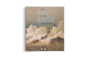The hardcover book The Awe of the Arctic: A Visual History, shown against a white background. The cover features a vintage illustration of explorers in a vast, icy landscape. A group of men are climbing a snowy slope near dark, choppy water, while one man stands alone on a high peak looking out.