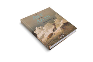 A hardcover book titled The Awe of the Arctic: A Visual History, presented at an angle on a white background. The cover features a vintage-style painting of explorers climbing a steep, snowy mountain, pulling a boat up the rocky incline.