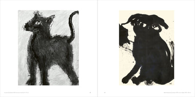 An open art book displaying two paintings on facing pages. On the left is a textured, charcoal-style painting of a black cat. On the right is an expressive, black ink wash painting showing the silhouette of a sitting dog.