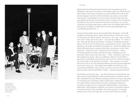 A black-and-white photograph on a book page showing a group of seven men and women from the Gruppe Spur artist collective. They are gathered on a patio at night, some sitting at a small table with drinks and others standing behind, all posing for the camera. A tall, old-fashioned lamppost stands behind them against the dark sky.