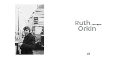 The cover for the book Ruth Orkin: A Photo Spirit. On the left is a black-and-white photograph of a woman in a coat and headscarf looking at the camera on a city street, with a double-decker bus in the background. On the right, the title is printed in grey and black text on a white background.