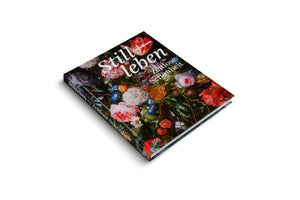 A hardcover art book titled Stillleben — Zeitlose Schönheit is shown at an angle against a white background. The cover features a detailed, baroque-style still-life painting of a dense and colorful bouquet of flowers against a dark backdrop.