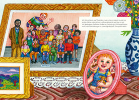 A colorful illustration of a tabletop displaying several framed photographs. The largest is a class picture where an exceptionally tall boy in a rainbow sweater waves from behind his classmates and teacher. In the foreground, a pink oval frame holds a photo of a smiling baby with its parents, and next to it is a small landscape painting. A vase of flowers sits on the right.