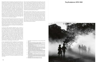 A black-and-white photograph showing people as dark silhouettes walking through a dense, white fog that billows through a wooded area. In the foreground, two figures walk away from the viewer, while more people are partially obscured by the mist in the background. The scene is from Fujiko Nakaya's 1976 art installation, Fog Sculpture.
