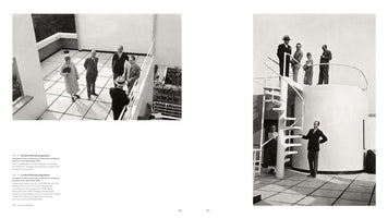 A two-page book spread with two black and white photos from 1928 on the roof terrace of the modernist Villa Stein-de Monzie. The left photo shows five people from a high angle on the tiled patio. The right photo shows a group posing on and around a white outdoor spiral staircase.
