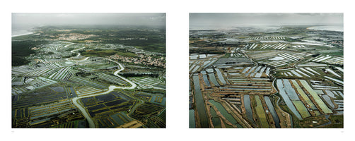 A diptych of two aerial photographs showing a sprawling coastal landscape under a cloudy sky. The images capture a vast, intricate network of salt marshes or oyster farms, their rectangular water basins forming a complex mosaic of green and grey patches against the land. A town and the sea are visible in the distance.