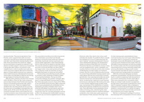 A two-page book spread featuring a colorful, painterly architectural illustration of a modern housing development. The vibrant, blocky buildings in shades of blue, red, and purple are integrated with and surround a historic, white Spanish-style church. The scene includes a street, palm trees, and cars under a bright yellow sky, with columns of text about urban housing below.