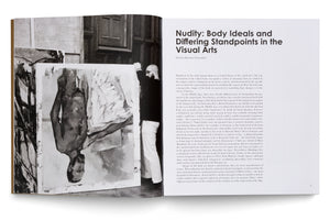 An open art book shows a two-page spread. The left page is a black-and-white photograph of a bald man with glasses holding a large, gestural painting of a nude figure. The right page is an essay titled Nudity: Body Ideals and Differing Standpoints in the Visual Arts.
