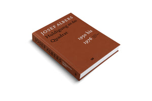 A studio photograph of a hardcover book with a textured, reddish-brown cover, resting on a white surface. The book is titled in German, JOSEF ALBERS Huldigung an das Quadrat, with the years 1950 bis 1976 also on the cover. The image is taken from a high angle, showing the front cover and the spine.