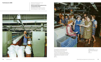 A two-page book spread about the textile industry in the German Democratic Republic. On the left, a color photo from 1982 shows a Black contract worker from Mozambique operating a large spinning machine. On the right, another 1982 color photo shows a group of white German female workers gathered together in the same factory.
