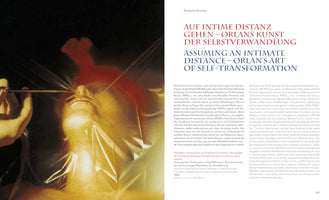 A two-page spread from a book about the artist ORLAN. The left page features a photograph of a surgical performance: a person's face, seen from below, is covered in a shiny transparent film. A gloved hand holds a pair of forceps near their mouth. The right page contains text in both German and English with the title: ASSUMING AN INTIMATE DISTANCE – ORLAN'S ART OF SELF-TRANSFORMATION.