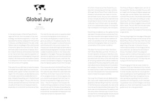 A page from a publication, numbered 218, titled Global Jury. Below a world map logo, the text is an article by Brent Lewis, the Global Jury Chair, reflecting on the 2022 World Press Photo contest. The text, arranged in three columns, discusses the jury's selection process, the new regional format, and the significance of the winning photographs and stories from around the world, including those from Ukraine and Afghanistan.