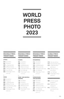 The German-language table of contents for the World Press Photo 2023 publication. The main title is followed by columns listing regional and global prize winners. Headings like Regionale Preisträger*innen (Regional Prizewinners) are above lists for Africa, Asia, Europe, North and Central America, South America, and Southeast Asia and Oceania. Each section includes categories like Einzelfoto (Single Photo) and Fotoserie (Photo Series) with page numbers. The page number 11 is at the bottom.