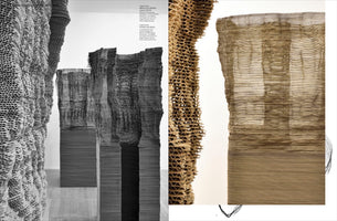 A composite image of large sculptures made from stacked corrugated cardboard. The left side is a black and white photograph of several tall, textured columns with undulating surfaces inside a gallery. The right side features two color close-up images, one showcasing the raw, corrugated edge of the material and the other showing the translucent, finely layered face of a sculpture.