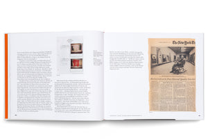 An open art book showing a two-page spread, pages 50 and 51, with text in German. The left page features two small Polaroid photos of abstract paintings. The right page displays a large clipping from a 1976 issue of The New York Times, which includes a black-and-white photograph of the artist Robert Motherwell sitting in a rocking chair in his studio, surrounded by his paintings.
