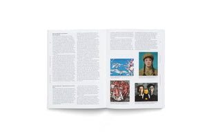 An angled, overhead view of a two-page spread from an open book. The pages, numbered 42 and 43, are written in German and feature columns of text alongside four color reproductions of contemporary Chinese paintings.