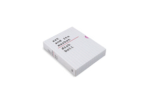 A book in a white slipcase, titled Art and its Market by Dirk Boll, is shown at an angle on a white background. The slipcase is designed like lined paper, with the title in a black typewriter font. A red line divides the title from the author's name. A pink tab is visible at the opening of the case.