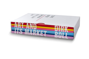 A collection of brightly colored books titled Art and Its Market by Dirk Boll, stacked inside a white slipcase designed to look like lined notebook paper. The spines of the books are red, yellow, pink, light blue, dark blue, and lavender, with the title and author's name in large white letters.