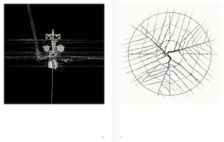 A two-page book spread. The image on the left shows a complex utility pole with a dense tangle of wires and transformers against a solid black background. The image on the right shows a sculpture of thorny branches arranged in a circular, web-like pattern on a solid white background.