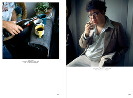 A book spread showing two color photographs by Roy Arden from the 1980s. On the left, a person pours red wine from a bottle into one of three mugs resting on the arm of a couch. On the right, a man with dark curly hair and glasses, wearing a tan blazer and a patterned shirt, sits and brings a cigarette to his lips.