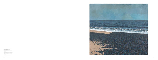 A two-page spread from an art book. The left page contains a small block of text. The right page features a square painting of a seascape titled Grey Seashore, 1978. The painting shows a dark pebble beach in the foreground that meets a narrow strip of sand. Dark blue ocean waves with white foam wash onto the shore under a muted, cloudy, grey-blue sky.