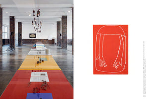 A two-panel image from an art publication. The left panel shows an art installation in a gallery with brick pillars. A long, colorful table displays various objects, and a sculpture made of bottles hangs from the ceiling. The right panel shows a red woodcut print with a simple white line drawing of a figure with long arms and outstretched hands.