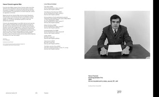 A two-page spread from a catalog for the steirischer herbst '22 festival. The left page contains an essay titled Harun Farocki against War. The right page features a large black-and-white still from Farocki's 1969 film Inextinguishable Fire, showing him in a suit, sitting at a desk and looking directly at the camera.