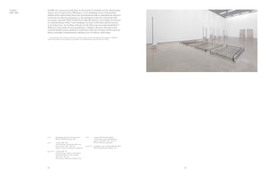 A two-page spread from an art book. The left page has text discussing the artist Doris Salcedo and her work, Untitled, 1989-2014. The right page shows a photograph of this installation in a spacious, white-walled gallery with a concrete floor. The artwork consists of multiple sculptures made from bare, metal bed frames. Several frames are laid flat in a row, while others stand upright, some holding stacks of folded, plaster-stiffened white shirts.