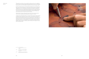 An open book spread shows text on the left page and a color photograph on the right. The photo is a close-up of two hands carefully using tweezers to stitch together overlapping, dried, reddish-brown rose petals with dark thread, creating a fragile, skin-like surface.