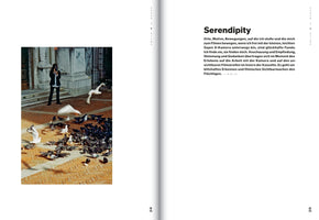 A two-page spread from a book. On the left, a color photograph shows a person in a suit filming a flock of pigeons in a sunlit, brick-paved courtyard. Several white birds are blurred in mid-flight. On the right, a page with German text is titled Serendipity. The page numbers 24 and 25 are at the bottom.