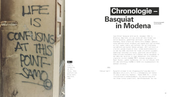 A page spread from a book about Jean-Michel Basquiat. The left page shows a photograph of his graffiti on a wall, which reads LIFE IS CONFUSING AT THIS POINT—SAMO©. The right page features German text under the title Chronologie – Basquiat in Modena.