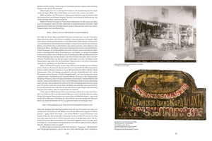A two-page spread from a book in German, showing text on the left page. The right page features a black-and-white photo of a general store in Tbilisi circa 1900 at the top, and a colorful, old painted sign for Kakhetian wine with Georgian and Cyrillic script at the bottom.