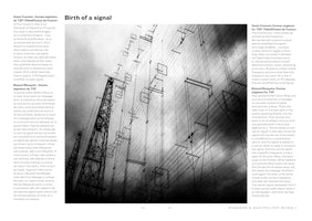 A black and white, low-angle photograph of a massive radio antenna array on a two-page spread titled Birth of a signal. A lattice tower stands on the left, part of a complex network of wires and geometric frames against a cloudy sky. The image is flanked by columns of text in French and English about radio engineering.