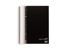 A vertical, front-on shot of the book Black Masculinities against a white background. The book cover is minimalist and mostly solid black. The title is written vertically in black capital letters along the left side, starting on the white spine and fading into the black cover. In the bottom right corner, white text reads EDITED BY JOSHUA AMISSAH, with the publisher HATJE CANTZ below.