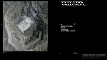 A two-page magazine spread. On the left, a full-bleed aerial photograph of the Aso volcanic crater shows its rugged, layered rock and a plume of white smoke rising from the center. The right page is black with white text, featuring the stylized title DEEP COOL BIOSPHERE and introducing an article titled A CONVERSATION WITH BARBARA SHERWOOD LOLLAR.