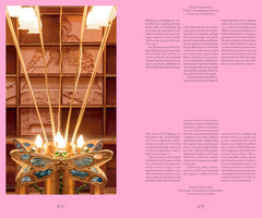 A two-page spread from a book, pages 102 and 103. The left page shows an ornate, golden Art Nouveau lamp with a large dragonfly at its base and several lit bulbs. Behind the lamp is a wall with intricate wood carvings. The right page contains text in both a Scandinavian language and English about Wolfgang von Kempelen's Mechanical Turk.