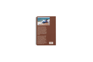 The back cover of a brown book, set against a white background. On the cover, there is a photograph of a person in a blue shirt lying on a beach with waves washing over them. Beside the photo is descriptive text in English and German, with a barcode at the bottom.