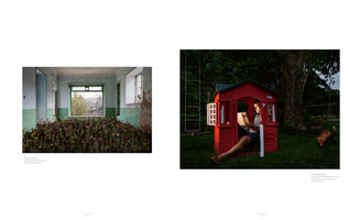 A two-page photo spread. On the left, a derelict room with peeling walls has its floor covered in a garden of colorful flowers. On the right, a man sits inside a tiny red plastic playhouse in a backyard, working on his laptop while a dog walks nearby.