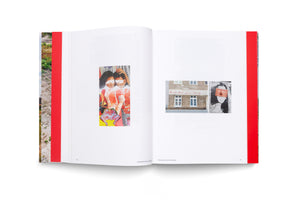 An overhead shot of an open art book on a white surface, showing pages 48 and 49. The book has a thick red inner spine. The left page features a colorful, vertical collage of a man and woman with their eyes obscured. The right page displays two smaller photos: one of a building with graffiti reading Do you know what love is, and another of a defaced portrait.