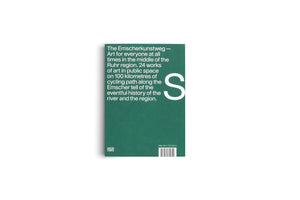 The back cover of a dark green book titled The Emscherkunstweg, shot against a white background. The cover features a description of the art project in white sans-serif text, with a large white letter S to the right. The publisher's logo for Hatje Cantz and an ISBN barcode are at the bottom.
