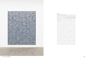 A page from an art catalog showing an installation on a white gallery wall. The artwork, titled Ashes to Ashes, is a large, precise grid of hundreds of small, rectangular, bluish-grey soap bars. An adjacent page provides text explaining the soap was made from the ashes and charcoal of a forest fire in Tuscany.