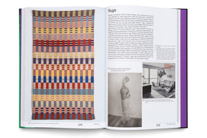 An open book spread on pages 274 and 275 about rugs. The left page features a full-page color photograph of a multicolored woolen nursery rug by Otti Berger with a geometric block pattern. The right page, titled Rugs, has text and two smaller black-and-white archival photos, one of Otti Berger in a costume and another of a domestic interior designed by Le Corbusier.
