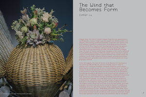 An article page from a publication. On the left is a close-up photograph of a round, woven sculpture topped with a dense arrangement of dried flowers and succulents. On the right, a column of text on a gray background is titled The Wind that Becomes Form by Esther Lu, introducing an essay about an art exhibition.