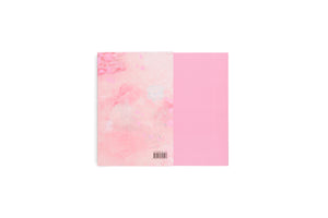 The back cover of a book, shot from above against a white background. The design is split vertically, with the left side featuring a light pink abstract marbled pattern and a barcode, and the right side being a solid, brighter pink.