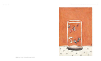 A page from a book displaying a painting of goldfish. The artwork shows a tall, cylindrical glass jar containing several small fish in red, white, and black. The jar rests on a white surface with black patterns against a textured orange background.