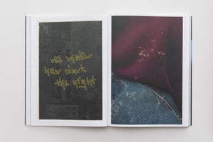 An open book displays a two-page spread. The left page features a dark photo with the text no matter how dark the night written in a yellow, hand-drawn style. The right page shows a close-up photograph of dandelion seeds resting on a person's maroon top and blue jeans.