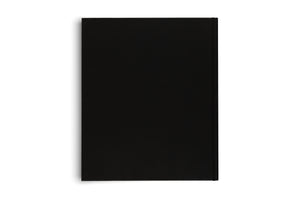 A top-down photograph of a plain, black hardcover book positioned vertically on a white background, casting a soft shadow to the left.